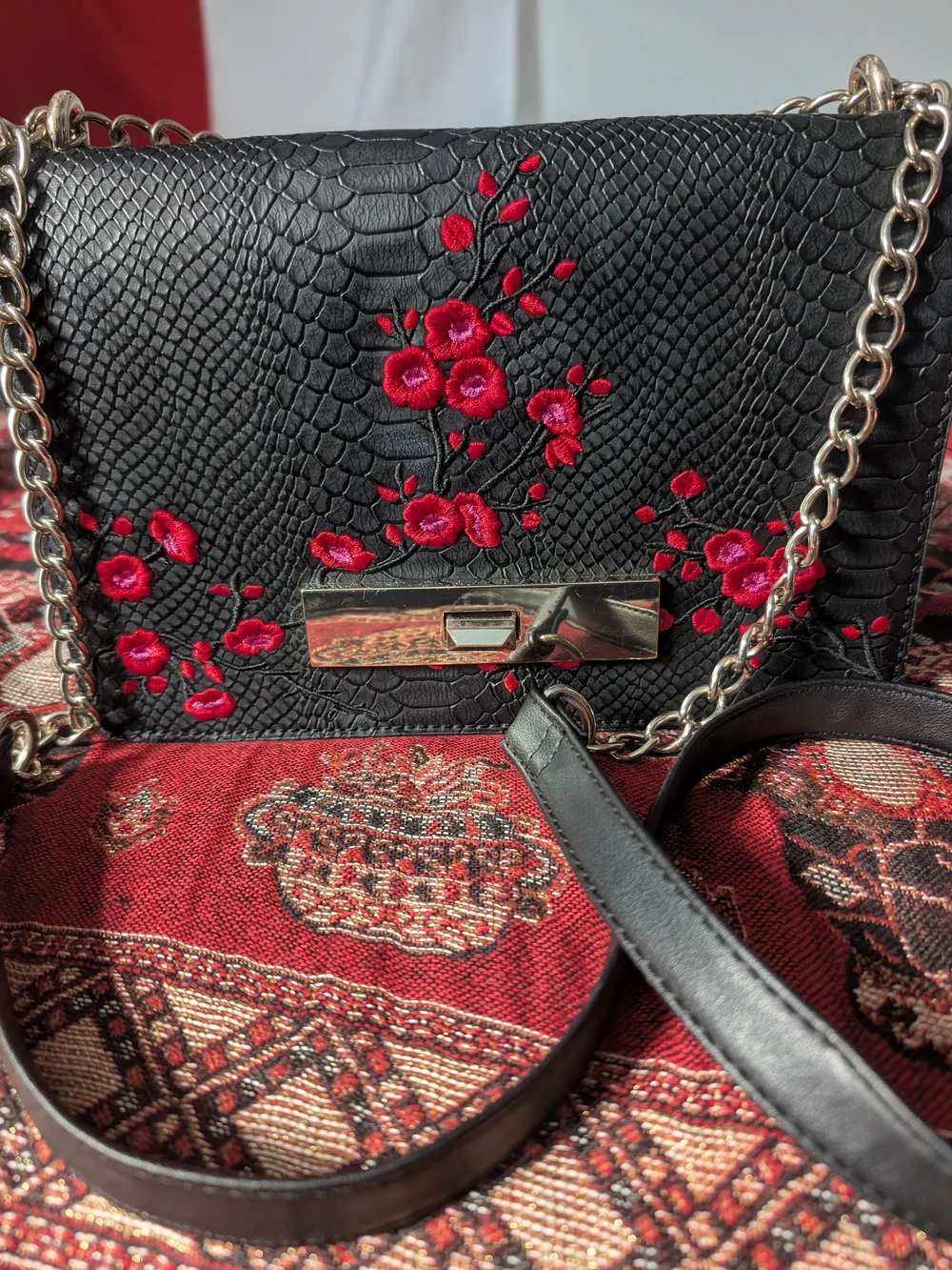 Black Embossed Leather Crossbody Bag with Red Floral Embroidery